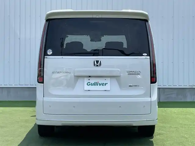 ホンダ ステップワゴン スパーダ eHEV プレミアムライン 香川県 2022(令4)年 3万km プラチナホワイトパール 登録時走行距離：29267km/純正SDナビゲーション/→CD/DVD 再生/→フルセグTV/全方位カメラ/ビルトインETC/ステアリングリモコン/レーダークルーズコントロール/シートヒーター/パワーシート/両側パワースライド/前後コーナーセンサー/LEDオートライト/フォグランプ/電格ウィンカーミラー/レーンキープアシスト/横滑り防止装置/衝突被害軽減システム/スマートキー