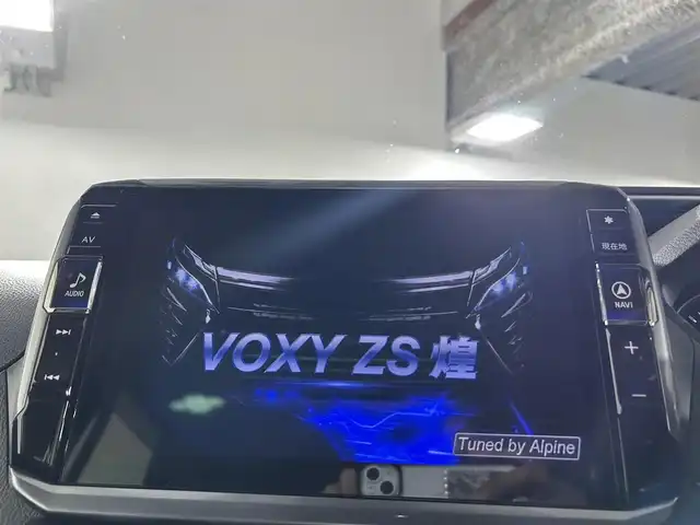 トヨタ ヴォクシー ZS 煌Ⅲ 佐賀県 2021(令3)年 3.7万km ブラック 社外11インチナビ（ALPAINE）/フルセグTV/Bluetooth/CD/DVD/バックカメラ/社外12.8インチフリップダウンモニター（ALPAINE）/モデリスタエアロ/両側パワースライドドア/ビルトインETC/前方・後方ドライブレコーダー/クルーズコントロール/トヨタセーフティーセンス/パーキングソナー/コーナーセンサー/先行車発進告知機能/衝突被害軽減ブレーキ/純正フロアマット/純正16インチアルミホイール/社外シートカバー/Wエアコン