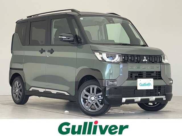 三菱 デリカミニ T プレミアム 愛知県 2025(令7)年 0.1千km ＤグリーンＭ マイパイロット/届出済未使用車/純正9型ディスプレイ/全方位カメラ/両側パワースライドドア/クルーズコントロール/シートヒーター/バックカメラ/コーナーセンサー/純正アルミホイール/ルーフレール/純正アルミホイール/LEDヘッドライト/パドルシフト/ステアリングヒーター/インテリジェントミラー/オートマチックハイビーム/衝突軽減システム/フルセグ/Bluetooth/ステアリングスイッチ/スマートキー/プッシュスタート