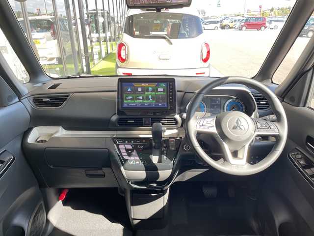 三菱 デリカミニ T プレミアム 愛知県 2025(令7)年 0.1千km ＤグリーンＭ マイパイロット/届出済未使用車/純正9型ディスプレイ/全方位カメラ/両側パワースライドドア/クルーズコントロール/シートヒーター/バックカメラ/コーナーセンサー/純正アルミホイール/ルーフレール/純正アルミホイール/LEDヘッドライト/パドルシフト/ステアリングヒーター/インテリジェントミラー/オートマチックハイビーム/衝突軽減システム/フルセグ/Bluetooth/ステアリングスイッチ/スマートキー/プッシュスタート