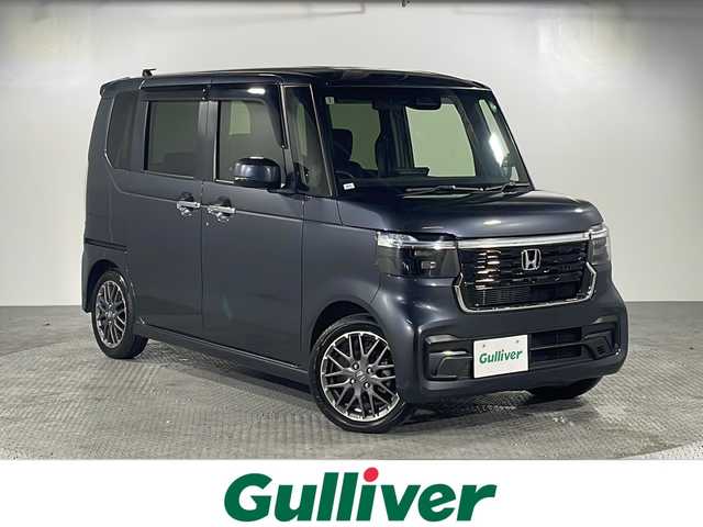 ホンダ Ｎ ＢＯＸ カスタム ターボ 沖縄県 2024(令6)年 0.9万km メテオロイドグレーメタリック 禁煙車/県外仕入れ/純正９インチナビ/【CD/DVD/フルセグTV/BT】/バックカメラ/ETC/両側パワースライドドア/純正サンシェード/横滑り防止装置/衝突被害軽減システム/USBポート/パドルシフト/電子パーキング/ハーフレザーシート/スマートキー