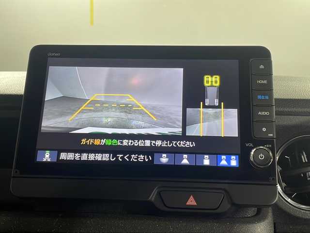ホンダ Ｎ ＢＯＸ カスタム ターボ 沖縄県 2024(令6)年 0.9万km メテオロイドグレーメタリック 禁煙車/県外仕入れ/純正９インチナビ/【CD/DVD/フルセグTV/BT】/バックカメラ/ETC/両側パワースライドドア/純正サンシェード/横滑り防止装置/衝突被害軽減システム/USBポート/パドルシフト/電子パーキング/ハーフレザーシート/スマートキー