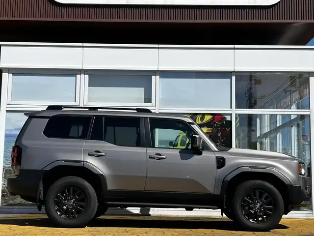 トヨタ ランドクルーザー ２５０ VX 道北・旭川 2024(令6)年 1.3万km アバンギャルドブロンズメタリック ワンオーナー/JBLサウンドシステム/全方位カメラ/フルセグTV/トヨタチームメイト/モデリスタパッケージ（フロント、リア）/モデリスタフェンダーガーニッシュ/丸目ヘッドライト/おくだけ充電/レザーシート/前席シートヒーター＆クーラー/ステアリングヒーター/デジタルインナーミラー（ドラレコ機能付き）/コーナーセンサー/ブラインドスポットモニター/パワーバックドア
