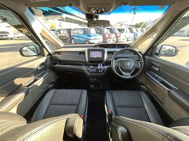 ホンダ フリード ハイブリット EX 愛知県 2017(平29)年 10.2万km ホワイトオーキッドパール ホンダセンシング/　・衝突軽減ブレーキ/　・誤発進抑制機能/　・アダプティブクルーズコントロール/　・車線維持システム/両側パワースライド/純正HDDナビ/　・フルセグTV/　・Bluetootｈ/　・CD/DVD/　・AM/FM/　・iPod/純正フロアマット/純正15インチAW/ハーフレザーシート/シートヒーター（前席）/LEDヘッドライト/オートライト/ビルトインETC/スマートキー