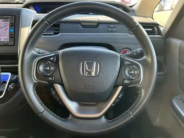 ホンダ フリード ハイブリット EX 愛知県 2017(平29)年 10.2万km ホワイトオーキッドパール ホンダセンシング/　・衝突軽減ブレーキ/　・誤発進抑制機能/　・アダプティブクルーズコントロール/　・車線維持システム/両側パワースライド/純正HDDナビ/　・フルセグTV/　・Bluetootｈ/　・CD/DVD/　・AM/FM/　・iPod/純正フロアマット/純正15インチAW/ハーフレザーシート/シートヒーター（前席）/LEDヘッドライト/オートライト/ビルトインETC/スマートキー