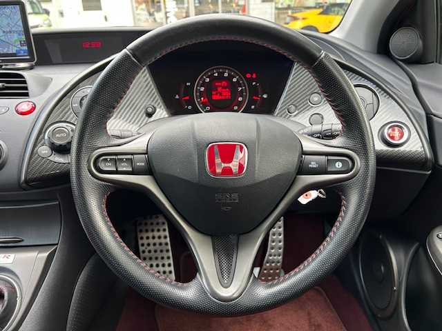 ホンダ シビック タイプR ユーロ 東京都 2010(平22)年 4.9万km ミラノレッド 6MT/社外ナビ/バックカメラ/アルカンターラバケットシート（黒/赤）/HIDヘッドランプ/レッドスティッチ革巻きステアリングホイール/アルミ製球形シフトノブ/メタル製スポーツペダル/オートエアコン/「TYPER EURO」エンブレム/ETC/電動格納ミラー/ミラーヒーター/ドライブレコーダー（前方）/パワステ/パワーウィンドウ/シガーソケット/スペアキー/記録簿 H23～H28、H31~R7/保証書＆取扱説明書