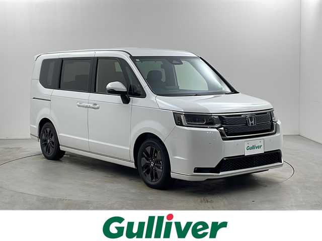 ホンダ ステップワゴン スパーダ eHEV 栃木県 2025(令7)年 0.1千km プラチナホワイトパール 登録済未使用車/純正11.4型ナビ(LXM-247VFLi)/（CD/DVD/Bluetooth/フルセグTV/USB）/バックカメラ/Honda CONNECT for Gathers＋ナビ装着用スペシャルパッケージ/Honda SENSING/●衝突軽減ブレーキ（CMBS）/●先行車発進お知らせ機能/●歩行者事故低減ステアリング/●路外逸脱抑制機能/●標識認識機能/●渋滞追従機能付アダプティブクルーズコントロール（ACC）/●車線維持支援システム（LKAS）/●トラフィックジャムアシスト（渋滞運転支援機能）/●誤発進抑制機能/●後方誤発進抑制機能/●近距離衝突軽減ブレーキ/●急アクセル抑制機能/●パーキングセンサーシステム/●後退出庫サポート/ブラインドスポットインフォメーション/パワーテールゲート(メモリー機能付)/2列目オットマン/運転席＆助手席シートヒーター/トリプルゾーンコントロール・フルオートエアコンディショナー/コンビシート/純正16インチアルミホイール(SPADA専用)/減速セレクター/全列USBチャージャー
