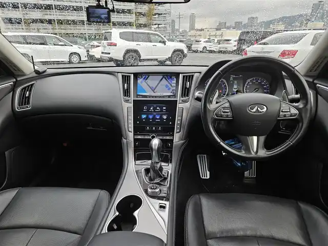 日産 スカイライン 200GT－t タイプSP 鹿児島県 2015(平27)年 9.2万km ブリリアントシルバー 純正8型ナビ/フルセグTV/アラウンドビューモニター/ビルトインETC/ドライブレコーダー/レーダークルーズコントロール/フロント/バックソナー/エマージェンシーブレーキ/後側方衝突防止支援システム/車線逸脱防止支援システム/後方車両検知警報/ターボ/LEDヘッドランプ/革巻きステアリング/パドルシフト/ブラック革シート/前席パワーシート/シートヒーター/運転席ポジションメモリー/社外19インチアルミホイール/スマートキー/プッシュエンジンスターター/禁煙車