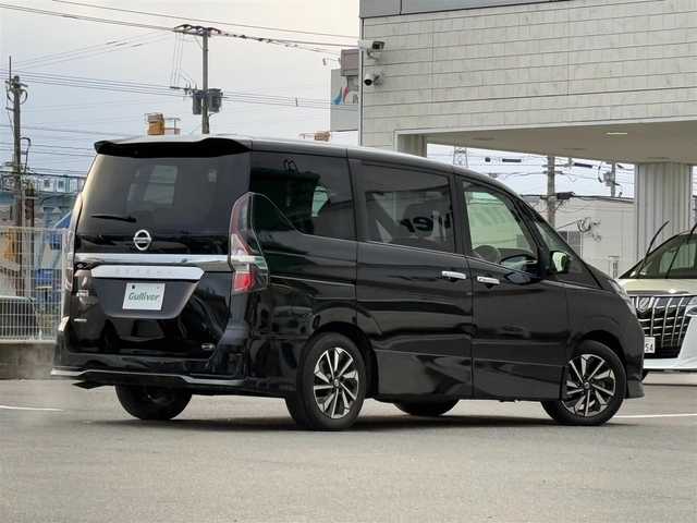 日産 セレナ ハイウェイスター V 愛媛県 2021(令3)年 2.4万km ダイヤモンドブラック 純正ナビ/(フルセグTV/CD/DVD/Bluetooth/SD/USB)/日産プロパイロット/アラウンドビューモニター/両側パワースライドドア/ETC/デジタルインナーミラー/アダプティブクルーズコントロール/エマージェンシーブレーキ/ブライングスポットモニター/LEDヘッドライト/フォグランプ/純正フロアマット/純正16インチアルミホイール/電動パーキングブレーキ/オートホールド/衝突被害軽減システム/横滑り防止装置/レーンキープアシスト/盗難防止装置/スペアキー1本/スマートキー/プッシュスタート