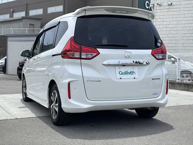 ホンダ フリード ハイブリット EX 山梨県 2016(平28)年 6.1万km ホワイトオーキッドパール 純正ナビ/ＥＴＣ/クルーズコントロール/シートヒーター/両側パワースライドドア　/ドライブレコーダー　/プッシュスタート/純正アルミホイール/オートマチックハイビーム/純正フロアマット/3列シート