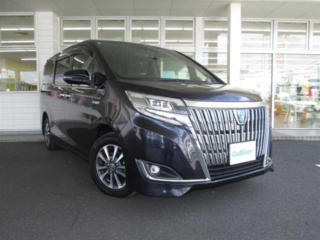 トヨタ エスクァイア ハイブリッド Gi 千葉県 2017(平29)年 6.6万km スパークリングブラックパールクリスタルシャイン 純正10型SDナビ、フルセグTV(キャンセラー有)/バックカメラ/純正オーディオ【DVD/CD/BT/SD】/Toyota Safety Sense C/両側パワースライドドア/LEDヘッドライト&LEDフォグランプ/クルーズコントロール/ウッドコンビステアリング/黒革シート/前席シートヒーター/スペアタイヤ/ビルトインETC2.0、スペアキー/取扱説明書/新車時保証書/トヨタ整備記録簿(H30/R1/2/3/4/5/6)