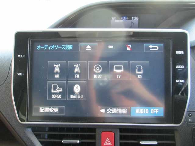 トヨタ エスクァイア ハイブリッド Gi 千葉県 2017(平29)年 6.6万km スパークリングブラックパールクリスタルシャイン 純正10型SDナビ、フルセグTV(キャンセラー有)/バックカメラ/純正オーディオ【DVD/CD/BT/SD】/Toyota Safety Sense C/両側パワースライドドア/LEDヘッドライト&LEDフォグランプ/クルーズコントロール/ウッドコンビステアリング/黒革シート/前席シートヒーター/スペアタイヤ/ビルトインETC2.0、スペアキー/取扱説明書/新車時保証書/トヨタ整備記録簿(H30/R1/2/3/4/5/6)