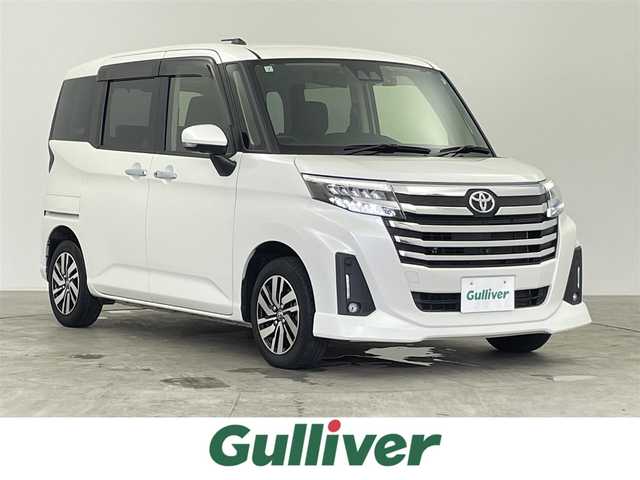 トヨタ ルーミー カスタムG 千葉県 2021(令3)年 2.7万km パールホワイトⅢ 禁煙車/スマートアシスト/・先行車発進/・衝突軽減/・車線逸脱警報　レーンキープアシスト/・標識認識機能/・コーナーセンサー/両側パワースライドドア　両側電動ドア/純正９インチナビ/・型式：NSZT-Y68T/・CD/DVD/Bluetooth/フルセグTV/SD/USB/HDMI/パノラミックビューモニター　全周囲カメラ　全方位カメラ/レーダークルーズコントロール/LEDヘッドライト/フォグランプ/オートライト/オートハイビーム/前席シートヒーター/純正14インチアルミホイール/ビルトインETC/スマートキー/プッシュスタートボタン/アイドリングストップ/オートエアコン/ウォークスルー/スペアキー/純正フロアマット/電動格納ミラー/ステアリングリモコン　ステアリングスイッチ/横滑り防止装置/電動パーキングブレーキ/オートブレーキホールド　