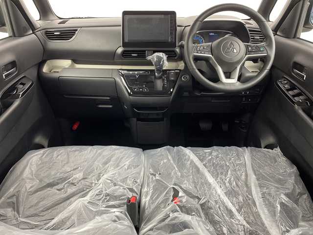 三菱 デリカミニ T プレミアム 新潟県 2025(令7)年 0.1千km アイボリー 4WD/純正9インチディスプレイオーディオ/(AppleCarPlay.AndroidAuto.Bluetooth)/全方位カメラ/両側パワースライドドア/ハーフレザーシート/シートヒーター/ステアリングヒーター/サイドデカール/コーナーセンサー/ヒルディセントコントロール/プッシュスタート/スマートキー/板キースペア