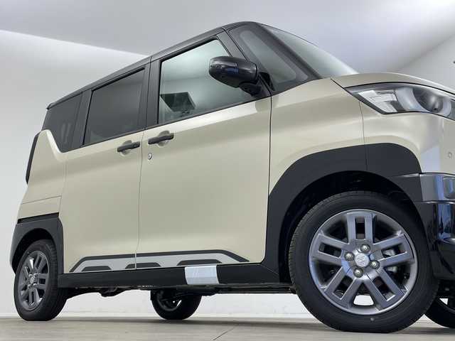 三菱 デリカミニ T プレミアム 新潟県 2025(令7)年 0.1千km アイボリー 4WD/純正9インチディスプレイオーディオ/(AppleCarPlay.AndroidAuto.Bluetooth)/全方位カメラ/両側パワースライドドア/ハーフレザーシート/シートヒーター/ステアリングヒーター/サイドデカール/コーナーセンサー/ヒルディセントコントロール/プッシュスタート/スマートキー/板キースペア