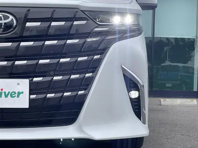 トヨタ アルファード Z 和歌山県 2025(令7)年 0.1千km プラチナホワイトパールマイカ 左右独立ムーンルーフ/純正14インチメーカーナビ/フルセグTV/パノラミックビューモニター/デジタルインナーミラー/プリクラッシュセーフティー/レーダークルーズコントロール/両側パワースライドドア/置くだけ充電/パワーシート/シートヒーター/シートエアベンチレーション/ステアリングヒーター/純正ドライブレコーダー/純正ビルトインETC2.0/純正アルミホイール/LEDヘッドライト/オートライト/オートマチックハイビーム