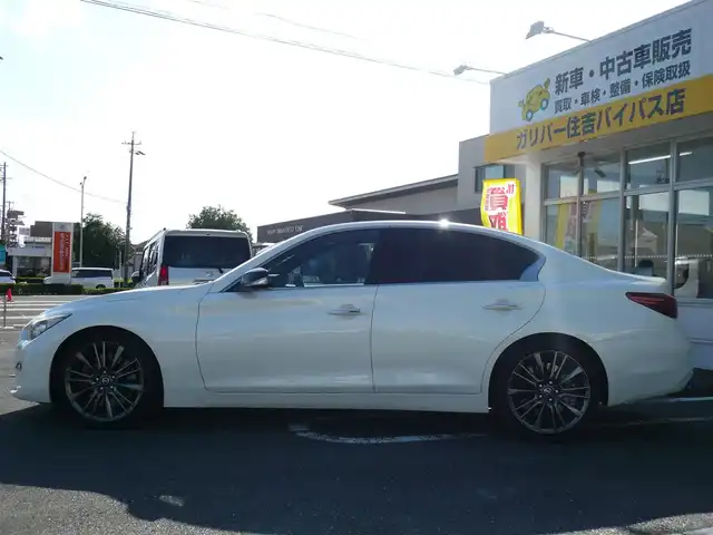 日産 スカイライン 400R 静岡県 2019(令1)年 10.3万km ブリリアントホワイトパール 禁煙車/レッドキャリパー/ブラックルーフペイント/インテリジェントダイナミックサス/BOSEサウンドシステム/アンビエントライトシステム/純正ナビ/（CD/DVD/BT/AUX/MusicBox/Apple car Play)/フルセグTV（キャンセラー）/ステアリングリモコン/全方位カメラ・バックカメラ/パドルシフト/社外マフラー/インテリジェントエマージェンシーブレーキ/インテリジェントクルーズコントロール/フロント・バックソナー/パワーシート（前席）/シートヒーター（前席）/前後ドライブレコーダー/ビルトインETC2.0/LEDヘッドライト/保証書・取扱説明書