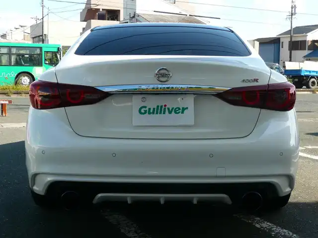 日産 スカイライン 400R 静岡県 2019(令1)年 10.3万km ブリリアントホワイトパール 禁煙車/レッドキャリパー/ブラックルーフペイント/インテリジェントダイナミックサス/BOSEサウンドシステム/アンビエントライトシステム/純正ナビ/（CD/DVD/BT/AUX/MusicBox/Apple car Play)/フルセグTV（キャンセラー）/ステアリングリモコン/全方位カメラ・バックカメラ/パドルシフト/社外マフラー/インテリジェントエマージェンシーブレーキ/インテリジェントクルーズコントロール/フロント・バックソナー/パワーシート（前席）/シートヒーター（前席）/前後ドライブレコーダー/ビルトインETC2.0/LEDヘッドライト/保証書・取扱説明書