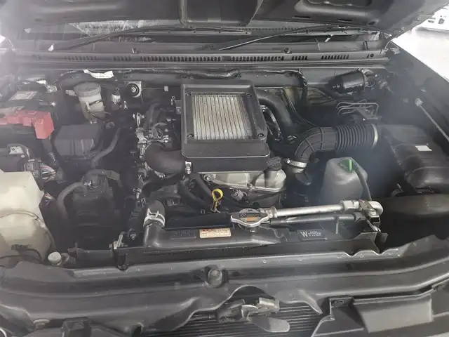 スズキ ジムニー ランドベンチャー 長崎県 2016(平28)年 8.4万km ブルーイッシュブラックパール3 IC付ターボ/社外LEDヘッドランプ/革巻きステアリング/ステアリングスイッチ/合皮シート/前席シートヒーター/純正16インチアルミホイール/リモコンキー/禁煙車