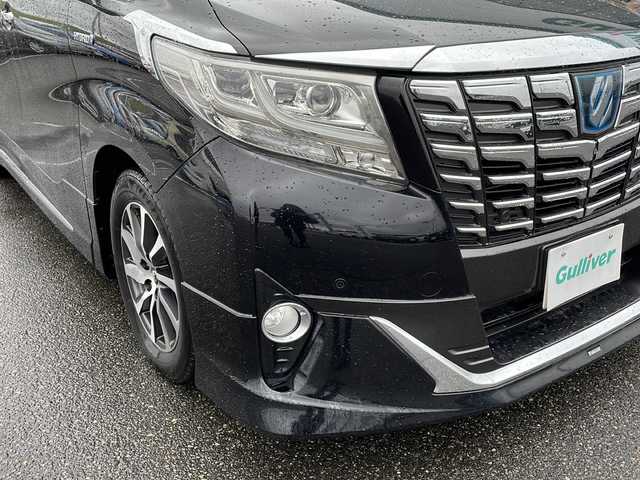トヨタ アルファードハイブリット エグゼクティブ ラウンジ 新潟県 2015(平27)年 13.8万km ブラック ４WD/フリップダウンモニター/モデリスタエアロ/JBLプレミアムサウンドシステム/パノラミックビューモニター/本革シート/エグゼクティブラウンジシート/レーダークルーズコントロール/プリクラッシュセーフティ/オートマチックハイビーム/クリアランスソナー/横滑り防止装置/両側パワースライドドア/パワーバックドア/オートブレーキホールド/AC100V1500Wアクセサリーコンセント/ETC2.0/ドライブレコーダー/純正ナビ/（CD/DVD/Blu-rayDisc/フルセグ/USB/Bluetooth）/LEDヘッドランプ/純正17インチアルミホイール