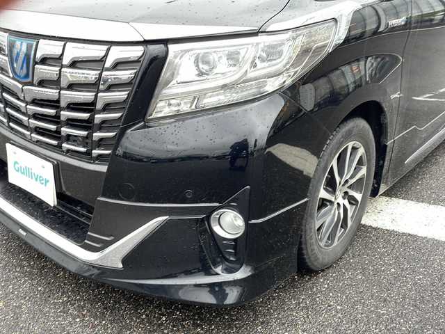 トヨタ アルファードハイブリット エグゼクティブ ラウンジ 新潟県 2015(平27)年 13.8万km ブラック ４WD/フリップダウンモニター/モデリスタエアロ/JBLプレミアムサウンドシステム/パノラミックビューモニター/本革シート/エグゼクティブラウンジシート/レーダークルーズコントロール/プリクラッシュセーフティ/オートマチックハイビーム/クリアランスソナー/横滑り防止装置/両側パワースライドドア/パワーバックドア/オートブレーキホールド/AC100V1500Wアクセサリーコンセント/ETC2.0/ドライブレコーダー/純正ナビ/（CD/DVD/Blu-rayDisc/フルセグ/USB/Bluetooth）/LEDヘッドランプ/純正17インチアルミホイール