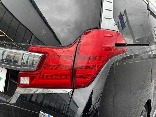 トヨタ アルファードハイブリット エグゼクティブ ラウンジ 新潟県 2015(平27)年 13.8万km ブラック ４WD/フリップダウンモニター/モデリスタエアロ/JBLプレミアムサウンドシステム/パノラミックビューモニター/本革シート/エグゼクティブラウンジシート/レーダークルーズコントロール/プリクラッシュセーフティ/オートマチックハイビーム/クリアランスソナー/横滑り防止装置/両側パワースライドドア/パワーバックドア/オートブレーキホールド/AC100V1500Wアクセサリーコンセント/ETC2.0/ドライブレコーダー/純正ナビ/（CD/DVD/Blu-rayDisc/フルセグ/USB/Bluetooth）/LEDヘッドランプ/純正17インチアルミホイール