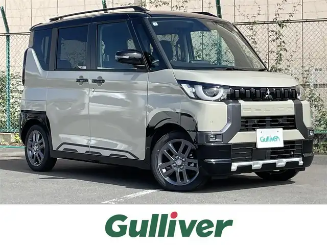 三菱 デリカミニ T プレミアム 東京都 2025(令7)年 0.1千km アイボリーⅡ 登録未使用車/三菱e-Assist/9型ディスプレイオーディオ/Apple CarPlay　Android Auto Bluetooth/・衝突被害軽減ブレーキシステム（歩行者検知付き）/・踏み間違い衝突防止アシスト/・標識認識システム/・先行車発進通知/・車線逸脱警報システム&車線逸脱防止支援機能/・ふらつき警報/・前方衝突予測警報/マイプロパイロット/両側パワースライドドア/ハンズフリーオートスライドドア/全方位カメラ/デジタルインナーミラー/レーダークルーズコントロール/LEDオートライト/前席シートヒーター/純正15インチアルミホイール/ルーフレール/パドルシフト/プッシュスタート/ビルトインETC