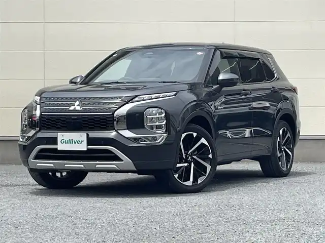 三菱 アウトランダー ＰＨＥＶ P 茨城県 2023(令5)年 0.1万km グラファイトグレーメタリック/ブラックマイカ BOSEサウンド/メーカーOP純正ナビ/・フルセグTV/・Bluetooth接続/・IPad/AppleCarPayプレイヤー接続/360度全方位カメラ/本革・ハーフレザーシート/レーダークルーズコントロール/ハンドルヒーター/全席シートヒーター/100V電源/USB入力端子/純正アルミホイール/ドライビングポジション/4WD/LEDオートライト/コーナーセンサー/パーキングアシスト/ステアリングスイッチ/電動リアゲート