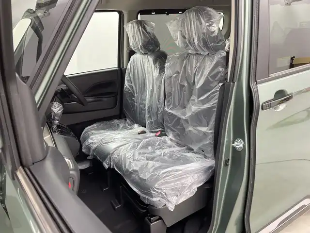 三菱 デリカミニ T プレミアム 新潟県 2025(令7)年 0.1千km 緑Ⅱ 4WD　/９インチディスプレイオーディオ/Bluetooth・USB・AppleCarPlay・AndroidAuto・HDMI/アラウンドビューモニター　/両側パワースライドドア　/ワンオーナー/ターボ/ＭＩ－ＰＩＬＯＴ　/追従クルーズコントロール/前後コーナーセンサー/レーンキープアシスト/ダウンヒルアシストコントロール/ＬＥＤオートライト　/オートマチックハイビーム/フォグランプ/デジタルインナーミラー　/サイドデカール　/ハンズフリースライド/ハーフレザーシート　/前席シートヒーター/アイドリングストップ/パドルシフト/標識認識/レザーステアリング/ステアリングリモコン/ステアリングヒーター/MTモード付AT/純正１５インチアルミホイール/スマートキー/スペアキー/保証書/取扱説明書