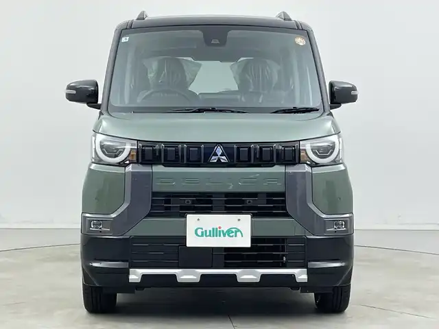 三菱 デリカミニ T プレミアム 新潟県 2025(令7)年 0.1千km 緑Ⅱ 4WD　/９インチディスプレイオーディオ/Bluetooth・USB・AppleCarPlay・AndroidAuto・HDMI/アラウンドビューモニター　/両側パワースライドドア　/ワンオーナー/ターボ/ＭＩ－ＰＩＬＯＴ　/追従クルーズコントロール/前後コーナーセンサー/レーンキープアシスト/ダウンヒルアシストコントロール/ＬＥＤオートライト　/オートマチックハイビーム/フォグランプ/デジタルインナーミラー　/サイドデカール　/ハンズフリースライド/ハーフレザーシート　/前席シートヒーター/アイドリングストップ/パドルシフト/標識認識/レザーステアリング/ステアリングリモコン/ステアリングヒーター/MTモード付AT/純正１５インチアルミホイール/スマートキー/スペアキー/保証書/取扱説明書