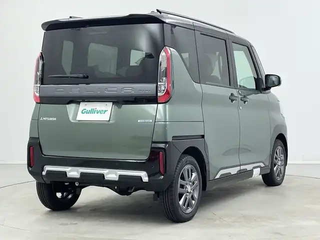 三菱 デリカミニ T プレミアム 新潟県 2025(令7)年 0.1千km 緑Ⅱ 4WD　/９インチディスプレイオーディオ/Bluetooth・USB・AppleCarPlay・AndroidAuto・HDMI/アラウンドビューモニター　/両側パワースライドドア　/ワンオーナー/ターボ/ＭＩ－ＰＩＬＯＴ　/追従クルーズコントロール/前後コーナーセンサー/レーンキープアシスト/ダウンヒルアシストコントロール/ＬＥＤオートライト　/オートマチックハイビーム/フォグランプ/デジタルインナーミラー　/サイドデカール　/ハンズフリースライド/ハーフレザーシート　/前席シートヒーター/アイドリングストップ/パドルシフト/標識認識/レザーステアリング/ステアリングリモコン/ステアリングヒーター/MTモード付AT/純正１５インチアルミホイール/スマートキー/スペアキー/保証書/取扱説明書