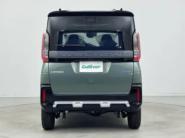 三菱 デリカミニ T プレミアム 新潟県 2025(令7)年 0.1千km 緑Ⅱ 4WD　/９インチディスプレイオーディオ/Bluetooth・USB・AppleCarPlay・AndroidAuto・HDMI/アラウンドビューモニター　/両側パワースライドドア　/ワンオーナー/ターボ/ＭＩ－ＰＩＬＯＴ　/追従クルーズコントロール/前後コーナーセンサー/レーンキープアシスト/ダウンヒルアシストコントロール/ＬＥＤオートライト　/オートマチックハイビーム/フォグランプ/デジタルインナーミラー　/サイドデカール　/ハンズフリースライド/ハーフレザーシート　/前席シートヒーター/アイドリングストップ/パドルシフト/標識認識/レザーステアリング/ステアリングリモコン/ステアリングヒーター/MTモード付AT/純正１５インチアルミホイール/スマートキー/スペアキー/保証書/取扱説明書