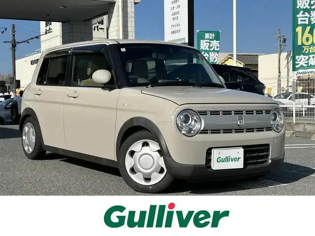 スズキ ラパン S 奈良県 2020(令2)年 5.9万km フォーンベージュM ワンオーナー/社外ナビ/Dインナーミラ―/シートヒータ/ETC/オートライト（LED）/バックカメラ/Bluetooth/スマートキー/スペアキー/レーンキープアシスト/横滑り防止/TV/保証書/取扱説明書