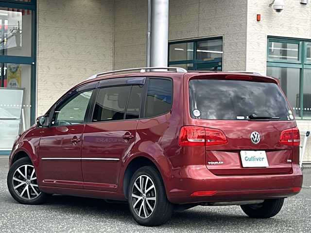 フォルクスワーゲン ゴルフ トゥーラン TSI ハイライン 愛知県 2013(平25)年 11.9万km ワイルドチェリーメタリック 純正ナビ/DVD/バックカメラ/アイドリングストップ/ミラーウィンカー/パドルシフト/純正フロアマット/純正アルミホイール/革巻きステアリング/クリアランスソナー/前後/フォグランプ/ルーフレール/カーテンエアバッグ/ETC/ドアバイザー