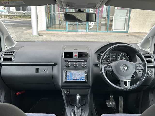 フォルクスワーゲン ゴルフ トゥーラン TSI ハイライン 愛知県 2013(平25)年 11.9万km ワイルドチェリーメタリック 純正ナビ/DVD/バックカメラ/アイドリングストップ/ミラーウィンカー/パドルシフト/純正フロアマット/純正アルミホイール/革巻きステアリング/クリアランスソナー/前後/フォグランプ/ルーフレール/カーテンエアバッグ/ETC/ドアバイザー