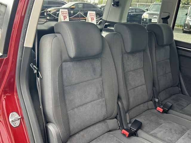 フォルクスワーゲン ゴルフ トゥーラン TSI ハイライン 愛知県 2013(平25)年 11.9万km ワイルドチェリーメタリック 純正ナビ/DVD/バックカメラ/アイドリングストップ/ミラーウィンカー/パドルシフト/純正フロアマット/純正アルミホイール/革巻きステアリング/クリアランスソナー/前後/フォグランプ/ルーフレール/カーテンエアバッグ/ETC/ドアバイザー