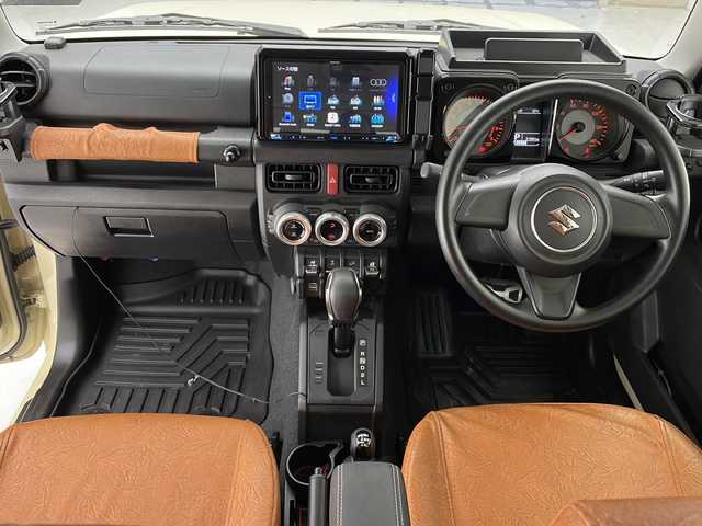 スズキ ジムニー XL 沖縄県 2021(令3)年 2.2万km シフォンアイボリーM 社外9インチナビ(MDV-M908HDL)/フルセグＴＶ　ＢＴ　ＤＶＤ　ＣＤ/バックカメラ/ＥＴＣ/シートカバー/プッシュスタート　/スマートキー/ダウンヒルアシスト/オートライト/社外ホイール（純正スチールホイール4本有り）/社外オーバーフェンダー/社外ステップバー/社外給油口カバー/社外牽引フック/社外スペアタイヤブラケット（純正パーツ有り）/保証書