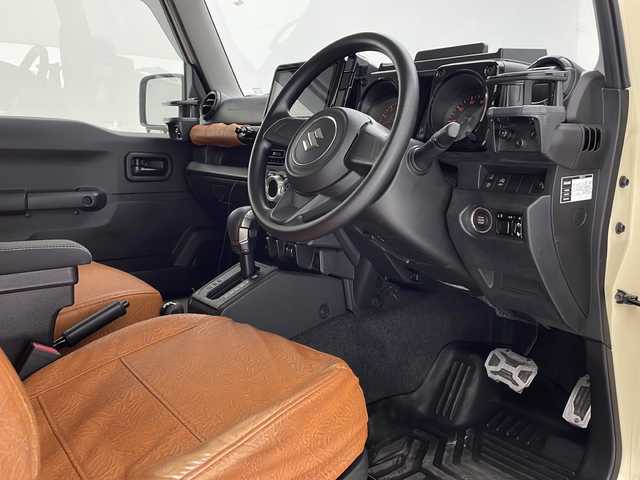 スズキ ジムニー XL 沖縄県 2021(令3)年 2.2万km シフォンアイボリーM 社外9インチナビ(MDV-M908HDL)/フルセグＴＶ　ＢＴ　ＤＶＤ　ＣＤ/バックカメラ/ＥＴＣ/シートカバー/プッシュスタート　/スマートキー/ダウンヒルアシスト/オートライト/社外ホイール（純正スチールホイール4本有り）/社外オーバーフェンダー/社外ステップバー/社外給油口カバー/社外牽引フック/社外スペアタイヤブラケット（純正パーツ有り）/保証書