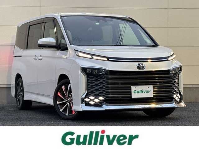 トヨタ ヴォクシー S－Z 茨城県 2022(令4)年 8.7万km ホワイトパールクリスタルシャイン ワンオーナー/ブラインドスポットモニター/ディスプレイオーディオプラス/・車載メモリーナビ/・DVD/CD/AM/FM/フルセグ/USB/HDMI/Miracast/バックカメラ/ETC2.0ユニット/ハンドルヒーター/セーフティセンス/・プリクラッシュセーフティ/・レーントレーシングアシスト/・レーンディパーチャーアラート/・レーダークルーズコントロール/・オートマチックハイビーム/・ロードサインアシスト/・ドライバー異常時対応システム/・プロアクティブドライビングアシスト/・発進遅れ告知機能/パーキングサポートブレーキ/前後ドライブレコーダー/シートヒーター/純正フロアマット/電動パーキングブレーキ/ブレーキホールド/スマートキー＆プッシュスタート/電動格納ミラー/純正17インチアルミホイール