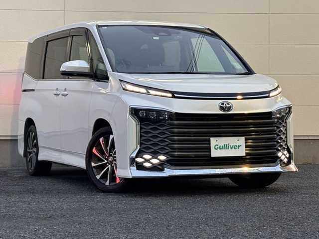 トヨタ ヴォクシー S－Z 茨城県 2022(令4)年 8.7万km ホワイトパールクリスタルシャイン ワンオーナー/ブラインドスポットモニター/ディスプレイオーディオプラス/・車載メモリーナビ/・DVD/CD/AM/FM/フルセグ/USB/HDMI/Miracast/バックカメラ/ETC2.0ユニット/ハンドルヒーター/セーフティセンス/・プリクラッシュセーフティ/・レーントレーシングアシスト/・レーンディパーチャーアラート/・レーダークルーズコントロール/・オートマチックハイビーム/・ロードサインアシスト/・ドライバー異常時対応システム/・プロアクティブドライビングアシスト/・発進遅れ告知機能/パーキングサポートブレーキ/前後ドライブレコーダー/シートヒーター/純正フロアマット/電動パーキングブレーキ/ブレーキホールド/スマートキー＆プッシュスタート/電動格納ミラー/純正17インチアルミホイール