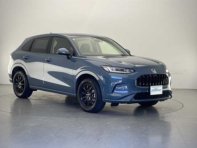 ホンダ ＺＲ－Ｖ ハイブリッド e:HEV Z 長野県 2024(令6)年 0.2万km ブルーグリーン 4WD/寒冷地仕様/純正ナビ/（フルセグ/Bluetooth/USB)/全方位モニター/ビルトインETC2.0/BOSEプレミアムサウンド/前方ドラレコ/前席パワーシート（D席メモリ付き）/前席シートヒーター/本革シート/衝突軽減ブレーキ/レーンキープアシスト/レーダークルーズコントロール/前後コーナーセンサー/ブラインドスポットモニター/踏み間違い防止/置くだけ充電/電子パーキング/革巻きステアリング/パワーバックドア/スマートキー/スペアキー