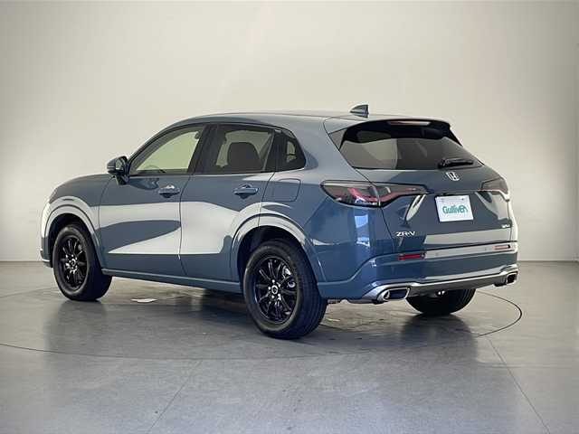 ホンダ ＺＲ－Ｖ ハイブリッド e:HEV Z 長野県 2024(令6)年 0.2万km ブルーグリーン 4WD/寒冷地仕様/純正ナビ/（フルセグ/Bluetooth/USB)/全方位モニター/ビルトインETC2.0/BOSEプレミアムサウンド/前方ドラレコ/前席パワーシート（D席メモリ付き）/前席シートヒーター/本革シート/衝突軽減ブレーキ/レーンキープアシスト/レーダークルーズコントロール/前後コーナーセンサー/ブラインドスポットモニター/踏み間違い防止/置くだけ充電/電子パーキング/革巻きステアリング/パワーバックドア/スマートキー/スペアキー