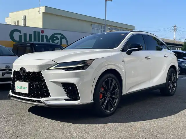 レクサス ＲＸ 350 Fスポーツ 静岡県 2023(令5)年 1.8万km ホワイトノーヴァガラスフレーク ワンオーナー/4WD/パノラマルーフ/純正ナビ/フルセグTV/BT/USB/全方位カメラ/赤革シート/運転席シートメモリー/前席パワーシート/前席シートヒーター/エアシート/パワーバックドア/プリクラッシュセーフティ/レーンキープアシスト/オートハイビーム/レーダークルーズコントロール/ブラインドスポットモニター/クリアランスソナー/前後ドライブレコーダー/AC100V電源/LEDヘッドライト/LEDフォグライト/ビルトインETC2.0/パドルシフト/純正21インチAW/スマートキー×2/保証書/取扱説明書