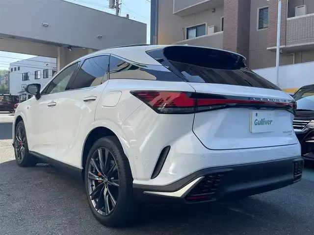 レクサス ＲＸ 350 Fスポーツ 静岡県 2023(令5)年 1.8万km ホワイトノーヴァガラスフレーク ワンオーナー/4WD/パノラマルーフ/純正ナビ/フルセグTV/BT/USB/全方位カメラ/赤革シート/運転席シートメモリー/前席パワーシート/前席シートヒーター/エアシート/パワーバックドア/プリクラッシュセーフティ/レーンキープアシスト/オートハイビーム/レーダークルーズコントロール/ブラインドスポットモニター/クリアランスソナー/前後ドライブレコーダー/AC100V電源/LEDヘッドライト/LEDフォグライト/ビルトインETC2.0/パドルシフト/純正21インチAW/スマートキー×2/保証書/取扱説明書