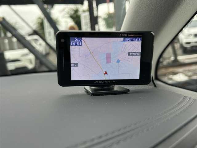 トヨタ アルファード S Cパッケージ 愛媛県 2021(令3)年 1.8万km ホワイトパールクリスタルシャイン 純正ナビ（Bluetooth/フルセグTV）/レーダークルーズコントロール/前後ドライブレコーダー/バックカメラ/USB入力端子/100V充電/三列シート/パワーシート/ステアリングヒーター/シートヒーター/エアシート/サンルーフ/オットマン/電動リアゲート/両側パワースライドドア/純正フロアマット/純正アルミホイール/前後コーナーセンサー/LEDヘッドライト/オートマチックハイビーム