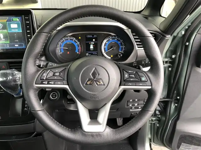 三菱 デリカミニ T プレミアム 愛知県 2025(令7)年 0.1千km 緑Ⅱ 届け出済み未使用車/純正ディスプレイオーディオ/（Bluetooth/AppleCarPlay/AndroidAuto/FM/AM/HDMI）/全方位カメラ/e-Assist/両側パワースライドドア/ハーフレザー/シートヒーター/ステアリングヒーター/電子パーキング/オートホールド/デジタルインナーミラー/オートライト/ダウンヒル/スマートキー/プッシュスタート/スペアキー/ステアリングリモコン/後席サーキュレーター/ロールサンシェード/純正LEDライト/ルーフレール