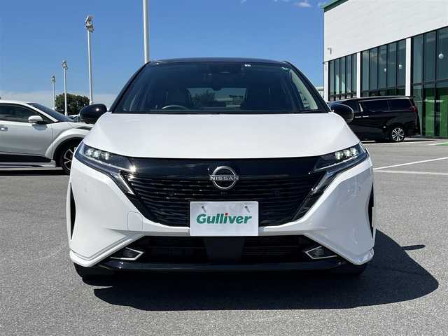 日産 オーラ G レザーエディション 奈良県 2022(令4)年 0.7万km ピュアホワイトパール / スーパーブラック 2トーン フルセグナビ　/Ｂｌｕｅｔｏｏｔｈ　/ＢＯＳＥサウンド　/１オーナー　/ＥＴＣ２．０　/全方位モニター　/スマートキー　/ドライブレコーダー　/ステアリングヒーター　/置くだけ充電　/シートヒーター　/Ｄインナーミラー/寒冷地仕様/ブラインドスポットモニター