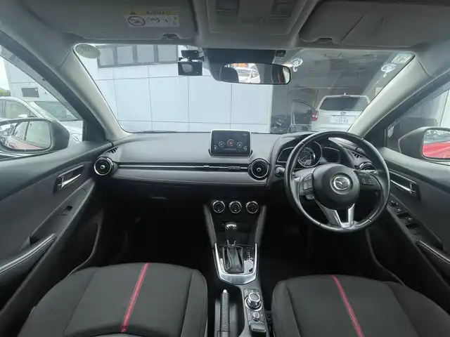 マツダ デミオ XD ツーリング 神奈川県 2015(平27)年 5.7万km ソウルレッドプレミアムメタリック (株)IDOMが運営する【じしゃロン秦野店】の自社ローン専用車両になりますこちらは現金またはオートローンご利用時の価格です。自社ローンご希望の方は別途その旨お申付け下さい/純正ナビ　/Bluetooth接続/バックカメラ/ETC/クルーズコントロール/純正アルミホイール/ドライブレコーダー/ヘッドアップディスプレイ
