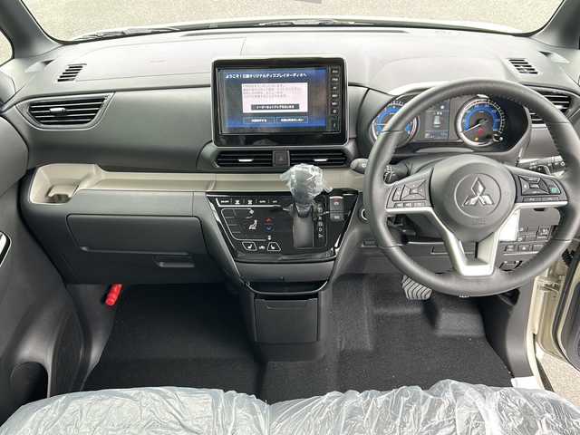 三菱 デリカミニ T プレミアム 岐阜県 2025(令7)年 0.1千km ナチュラルアイボリーメタリック 登録時走行距離13km/ワンオーナー/純正9型ディスプレイオーディオ/全方位カメラ・バックカメラ/Blue tooth・USB入力端子・iPod・AUX/衝突被害軽減システム/コーナーセンサー後方/LEDヘッドライト/オートライト/レーダークルーズコントロール/レーンキープアシスト/横滑り防止装置/盗難防止装置/純正15アルミホイール/エアバッグ運転席・助手席+サイド/ハーフレザーシート/シートヒーター前席/ベンチシート/フルフラットシート/両側パワースライドドア/プッシュスタート/スマートキー/ターボ車/ステアリングヒーター/保証書/取扱説明書/記録簿