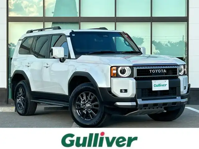 トヨタ ランドクルーザー ２５０ VX 和歌山県 2024(令6)年 0.9万km プラチナホワイトパールマイカ ワンオーナー/純正12.3インチナビ/フルセグTV/Bluetooth/USB/HDMI/全周囲カメラ/ビルトインETC2.0/デジタルインナーミラー/サンルーフ/トヨタセーフティセンス/BSM/レーダークルーズコントロール/クリアランスソナー/パワーバックドア/革巻きステアリング/ステアリングスイッチ/レザーシート/運転席パワーシート/シートメモリー/前席シートヒーター/前席シートベンチレーション/丸目LEDヘッドライト/フォグランプ/オートライト/プッシュスタート/スマートキー/スペアキー/取扱説明書
